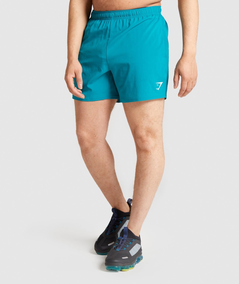 Gymshark Ankomst 5" Shorts Blågrønn