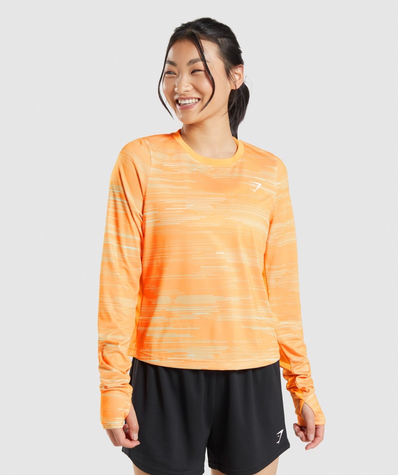 Gymshark Sport Løs Langermet T-skjorte Oransje Trykk