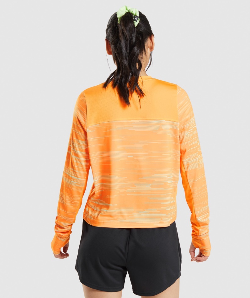 Gymshark Sport Løs Langermet T-skjorte Oransje Trykk